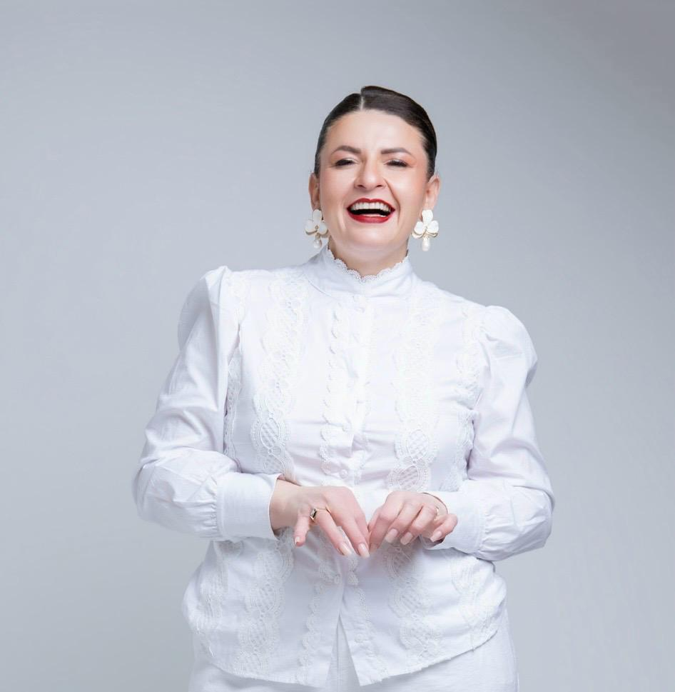 Portrait of Ciara Lessa in white