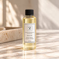 Maison Fragrance by Ciara Lessa Electric Diffuser Fragrance Oil Refill, Scent 062, 120 ml, in a clear cylindrical bottle with a black ribbed cap.