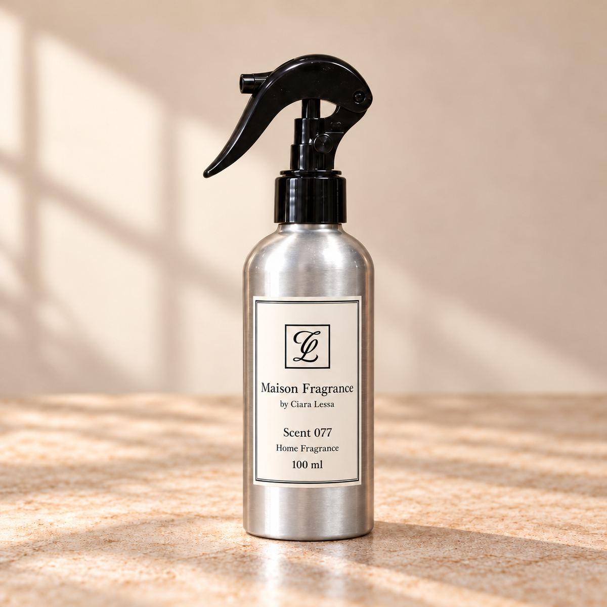 Maison Fragrance by Ciara Lessa, Scent 077, Home Fragrance, 100 ml; silver bottle with black trigger spray.