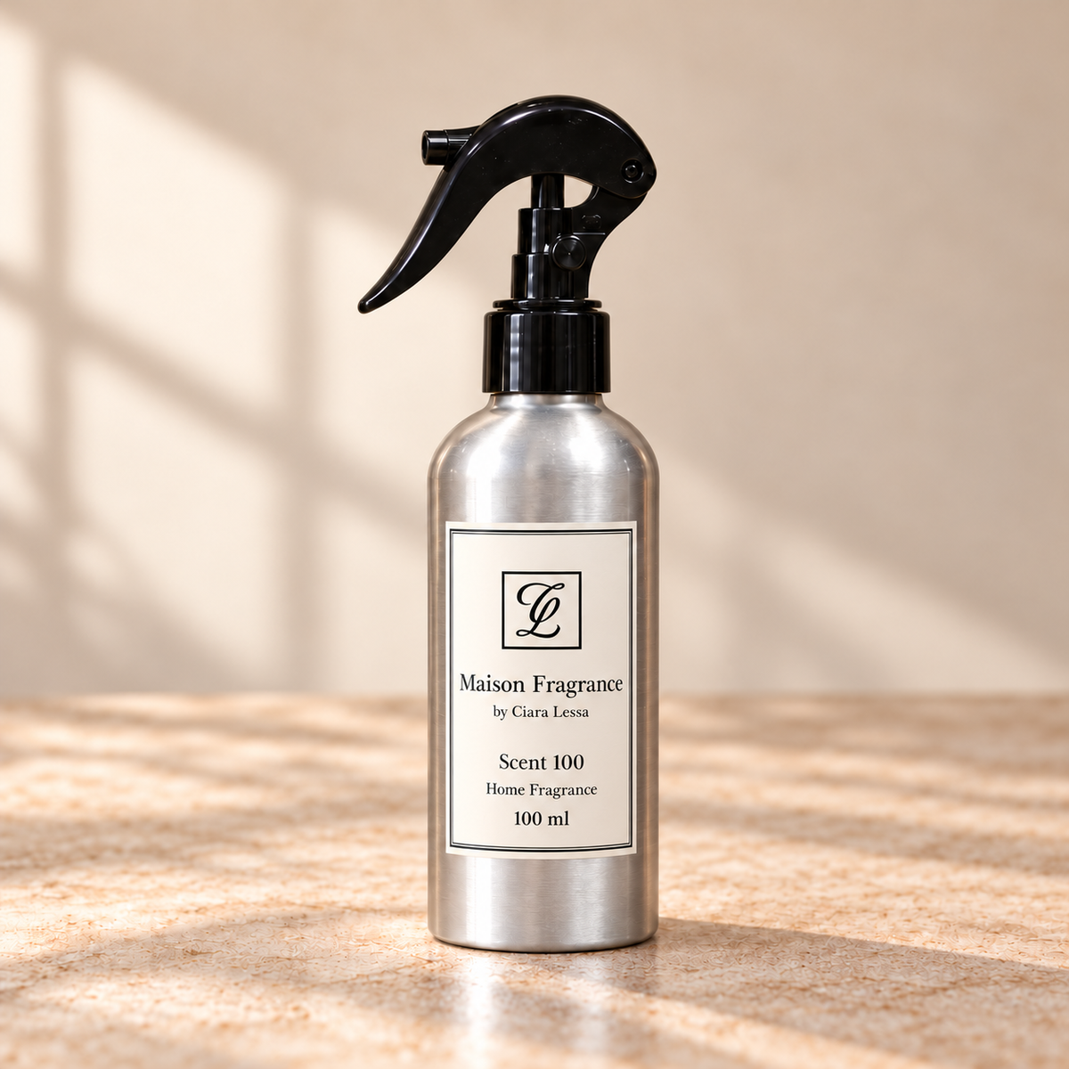 Maison Fragrance by Ciara Lessa, Scent 100, Home Fragrance, 100 ml; silver bottle with black trigger spray.