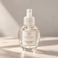 Maison Fragrance by Ciara Lessa Wall Plug Refill, Scent 048, 30 ml, in a rounded clear bottle with a translucent cap.