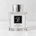 Maison Fragrance Scent 027 Reed Diffuser, 50ml, compact square clear glass bottle with silver cap on a light neutral background.