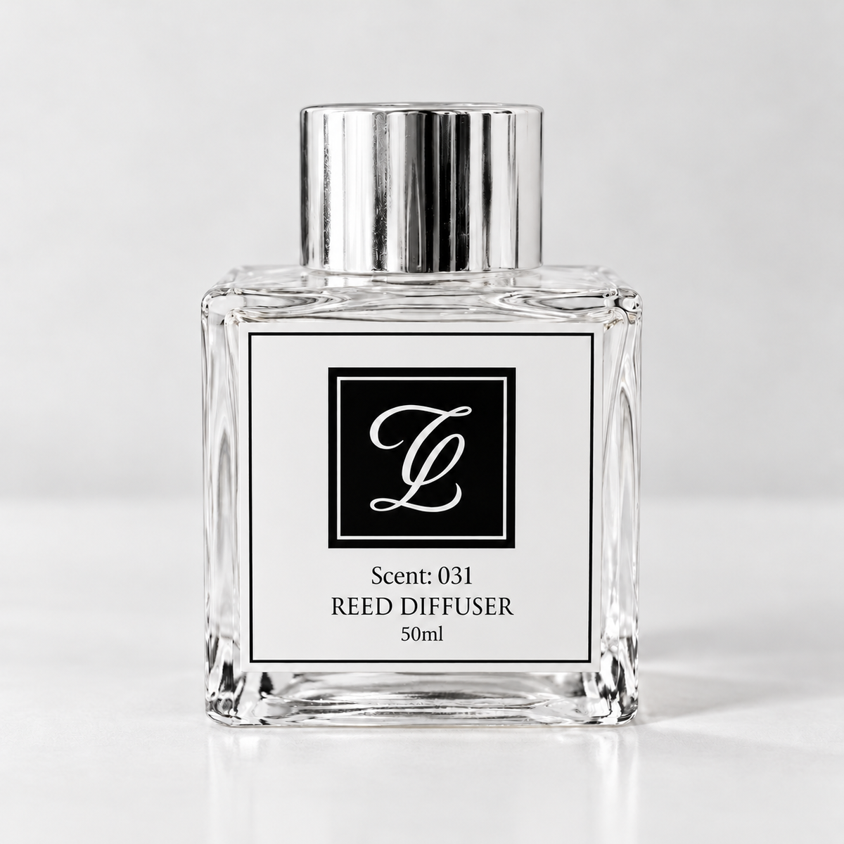Maison Fragrance Scent 031 Reed Diffuser, 50ml, compact square clear glass bottle with silver cap on a light neutral background.